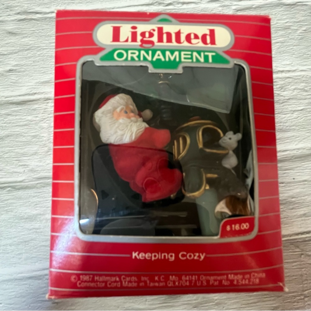 NIB Vintage Hallmark Keepsake Magic Lighted Santa Ornament "Keeping Cozy" 1987